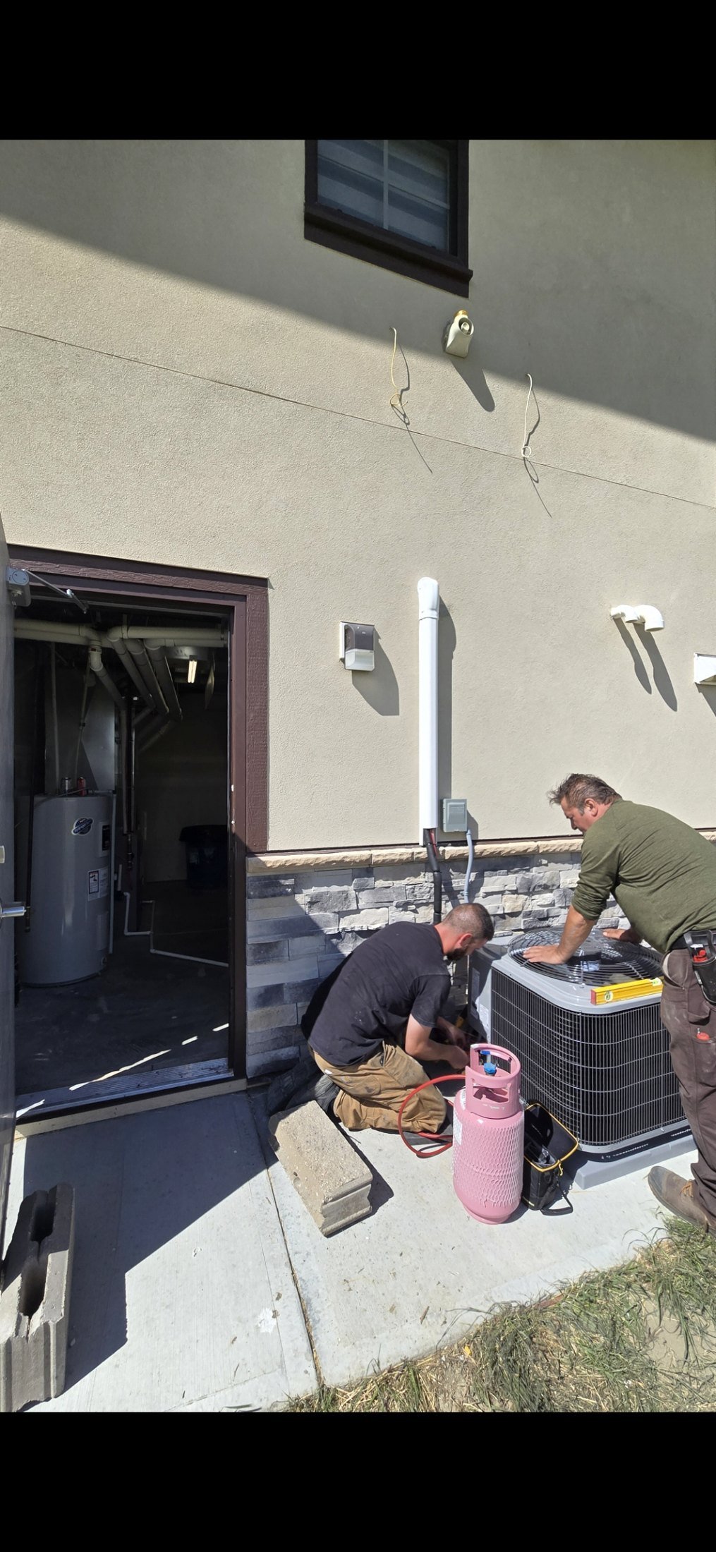 New AC line set and electrical connections completed in a Calgary home