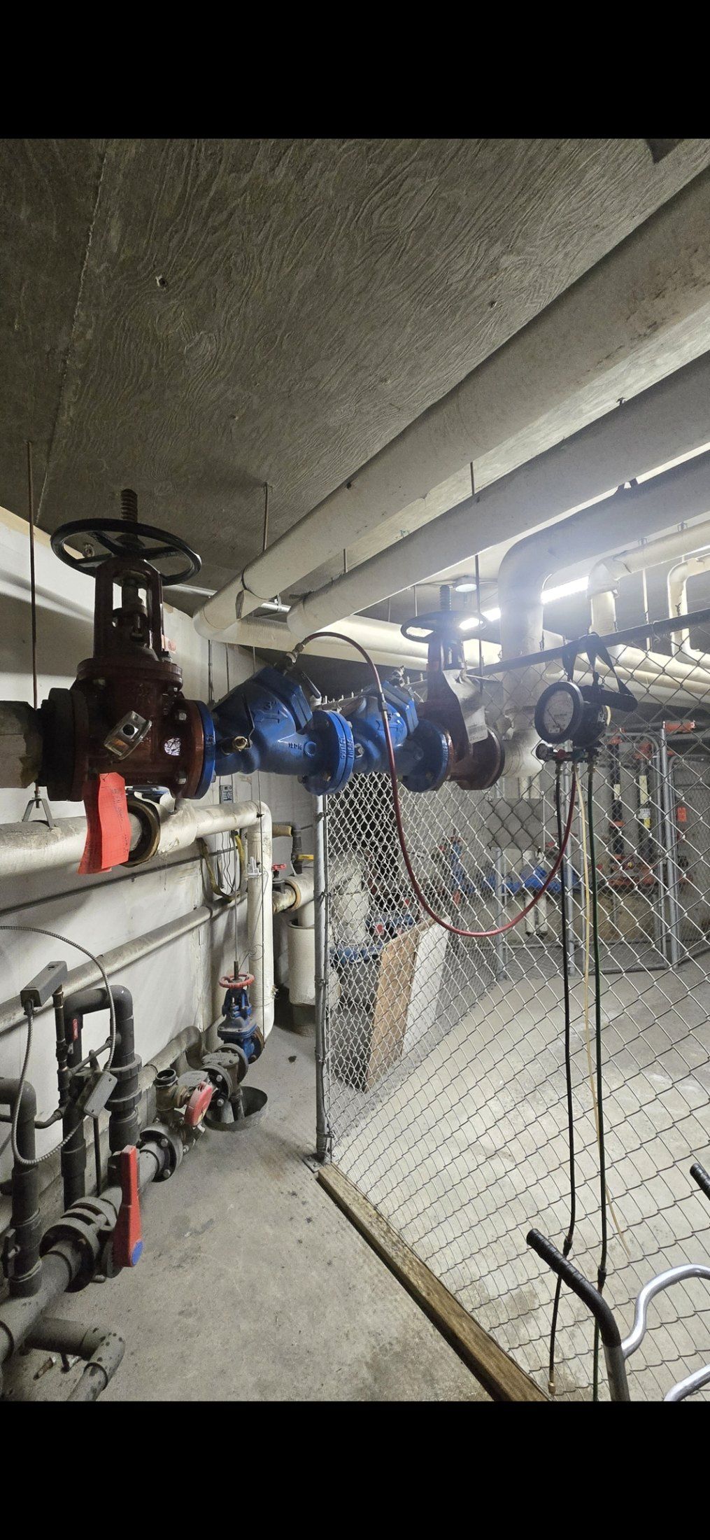 Certified backflow testing on a Calgary property by Flow Forge