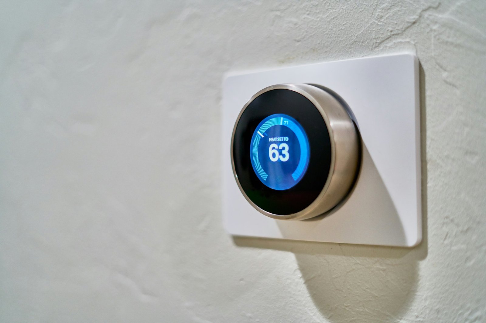 Smart thermostat installed in a Calgary home by Flow Forge Mechanical