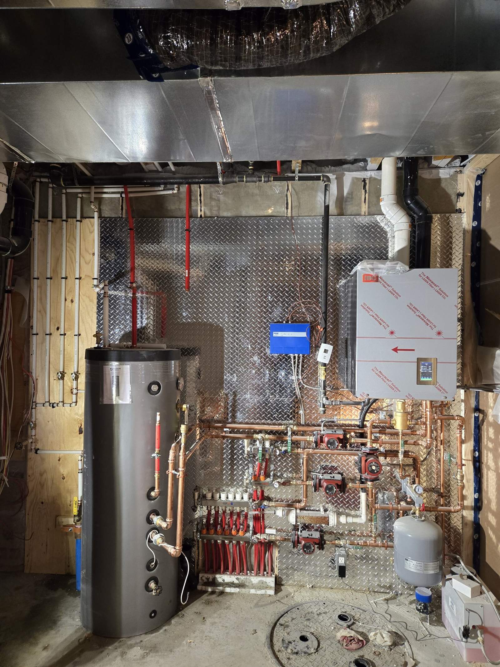 Calgary boiler manifold and circulators serviced by Flow Forge Mechanical