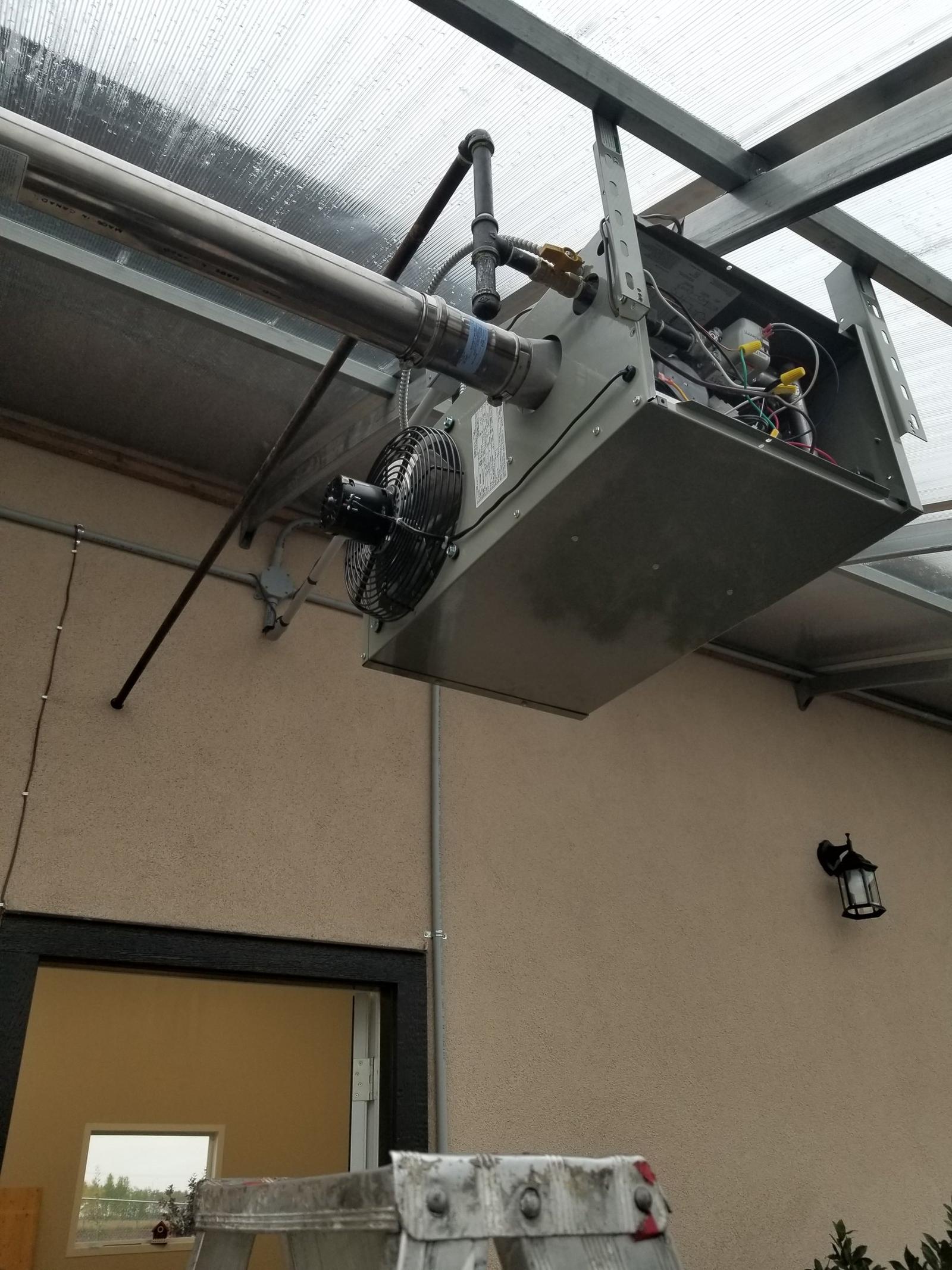 Natural gas garage heater installed in a Calgary garage by Flow Forge
