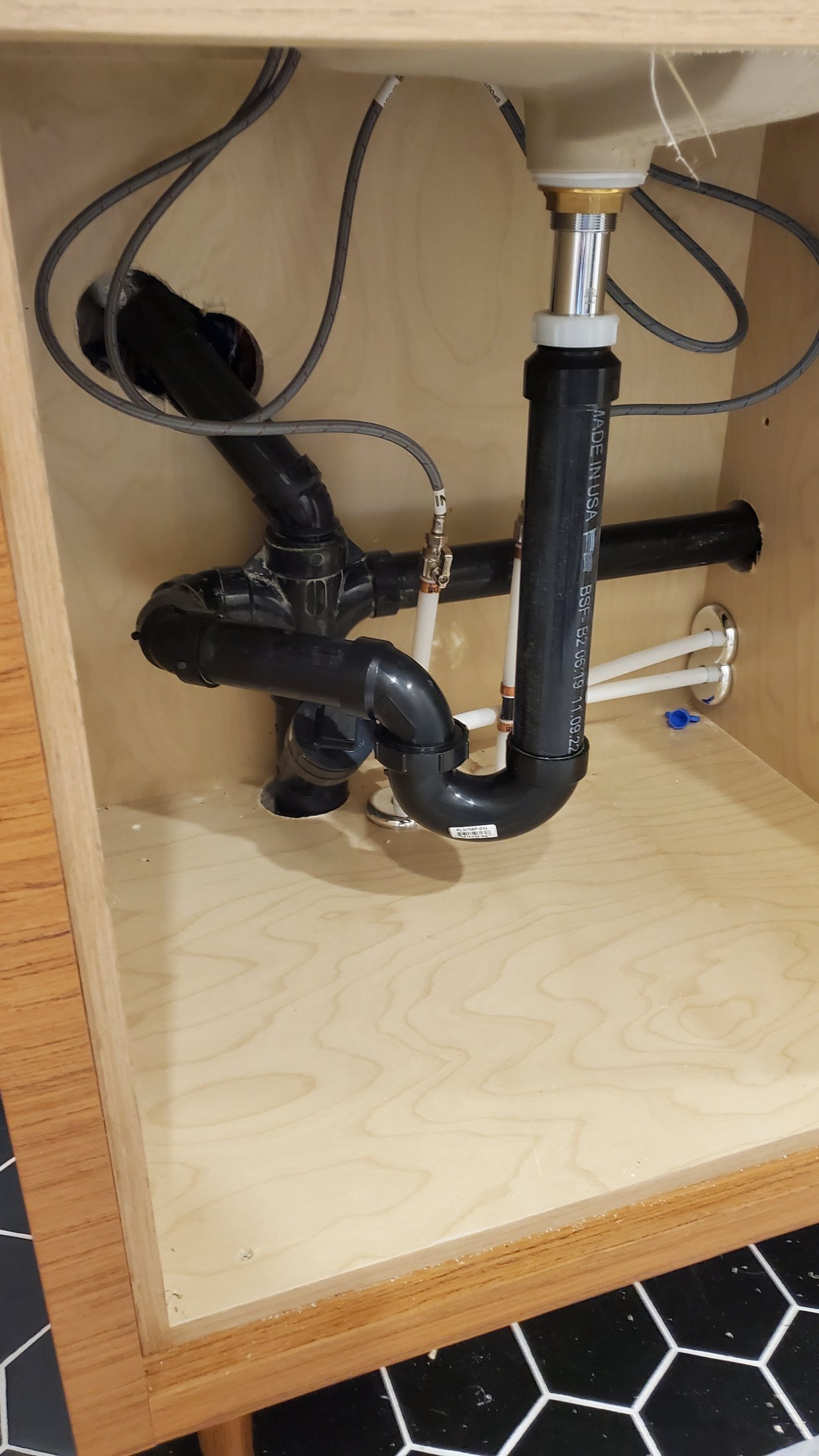 Close-up of repaired residential plumbing fixture in Calgary