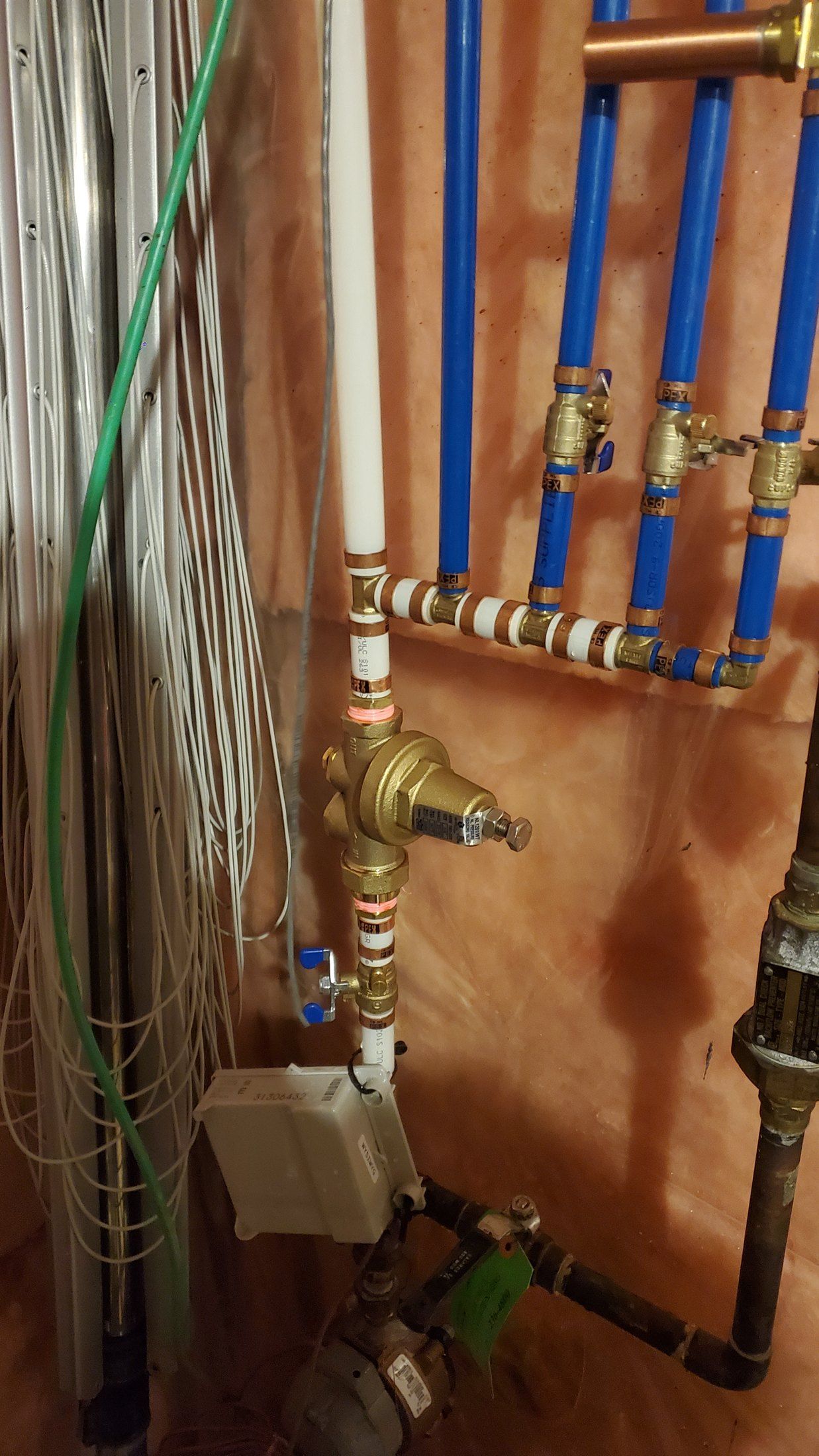 Calgary Poly-B pipe replacement detail showing clean PEX run by Flow Forge