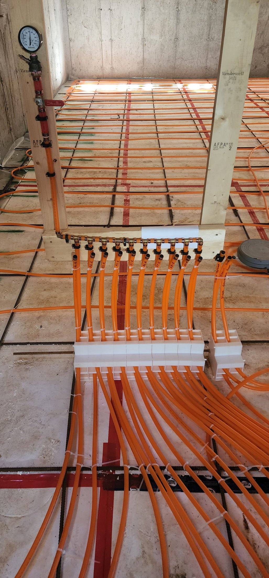 Calgary hydronic radiant floor manifold installed by Flow Forge